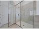 Bathroom featuring a large glass shower with modern fixtures at 2837 Darlington Oak Ln, Ocoee, FL 34761