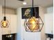Unique pendant lighting fixtures with geometric design, adding modern flair to the kitchen at 2837 Darlington Oak Ln, Ocoee, FL 34761