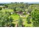 Community park featuring mature trees, playground equipment, and picnic areas at 2837 Darlington Oak Ln, Ocoee, FL 34761
