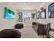Cozy room with a ceiling fan and a decorative television, perfect for relaxing or entertaining guests at 2843 Maria Isabel Ave, Ocoee, FL 34761