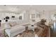 Spacious living area showcases an open concept to dining and kitchen with white cabinets at 2843 Maria Isabel Ave, Ocoee, FL 34761