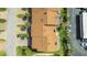 Aerial view of townhome roofs, driveways, and landscaping at 33 Sea Haven Dr, Ponce Inlet, FL 32127