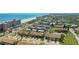 Aerial view of townhomes, landscaping, and the adjacent beach at 33 Sea Haven Dr, Ponce Inlet, FL 32127