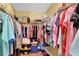 Walk-in closet with wire shelving and lots of space for storing clothes and accessories at 33 Sea Haven Dr, Ponce Inlet, FL 32127
