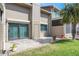 A view of the back patio, yard, and sliding glass doors at 33 Sea Haven Dr, Ponce Inlet, FL 32127