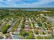 Beautiful aerial view of the community and neighborhood featuring tree-lined streets at 33215 Kaylee Way, Leesburg, FL 34788