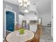 Inviting eat-in kitchen with views of kitchen and living spaces at 33215 Kaylee Way, Leesburg, FL 34788