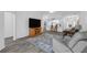 Bright open floorplan with light gray vinyl floors and neutral walls at 33215 Kaylee Way, Leesburg, FL 34788