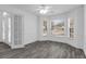 Bright living room with many windows, natural light and wood flooring at 33215 Kaylee Way, Leesburg, FL 34788