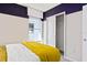 Bright bedroom featuring a sliding closet door and a sunny window view at 3611 Cambridge Brook Dr, Davenport, FL 33837