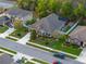 Aerial view of property with solar panels, screened pool, and landscaping at 3637 Chandler Estates Dr, Apopka, FL 32712