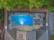 Aerial view of the screened pool and solar panels on this residence at 3637 Chandler Estates Dr, Apopka, FL 32712
