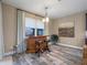 Charming bar area with custom wood bar and barstools near a window at 3637 Chandler Estates Dr, Apopka, FL 32712