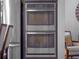Stainless steel oven and refrigerator in the kitchen add a touch of modern luxury at 3637 Chandler Estates Dr, Apopka, FL 32712