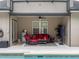 Relaxing covered patio area with comfortable outdoor seating and a view of the beautiful screened-in pool at 3637 Chandler Estates Dr, Apopka, FL 32712