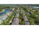 An aerial view highlighting the neighborhood's layout, lake access and the overall community design at 3664 Wilshire Way Rd # 261, Orlando, FL 32829