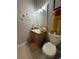 Kid-friendly bathroom with cartoon decor, a single vanity and coordinated accessories at 3664 Wilshire Way Rd # 261, Orlando, FL 32829