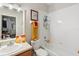 Bathroom featuring tile surround shower/tub and vanity at 3664 Wilshire Way Rd # 261, Orlando, FL 32829