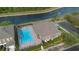 A community pool with ample seating, offering a relaxing amenity for residents at 3664 Wilshire Way Rd # 261, Orlando, FL 32829