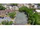 Aerial view of community tennis court, providing a space for recreation and active living at 4355 Perkinshire Ln # 103, Orlando, FL 32822