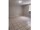 Bright bedroom with tiled floors and a window unit AC, providing a comfortable environment at 625 Citrus St, Orlando, FL 32805