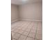 Cozy bedroom with tiled flooring, creating a minimalist and comfortable space at 625 Citrus St, Orlando, FL 32805
