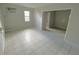 Spacious living area with tiled floors and ample natural light, perfect for relaxation at 625 Citrus St, Orlando, FL 32805