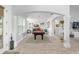 Bright open living area with a billiard table, tile flooring, and a view to another room at 720 Basin Dr, Kissimmee, FL 34744
