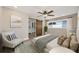 Cozy bedroom with a barn door to the bathroom, and plenty of natural light at 769 Little Wekiva Cir, Altamonte Springs, FL 32714