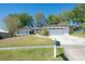 Charming single-story home featuring a two-car garage, well-maintained lawn, and inviting curb appeal at 769 Little Wekiva Cir, Altamonte Springs, FL 32714