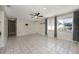 Bright living room featuring tile floors, a ceiling fan and neutral walls at 769 Little Wekiva Cir, Altamonte Springs, FL 32714