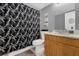 Bathroom featuring patterned shower curtain, granite countertop vanity, and toilet at 8217 Sun Spring Cir # 41, Orlando, FL 32825