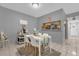 Dining area with a coffee bar, tile flooring, and seating for four at 8217 Sun Spring Cir # 41, Orlando, FL 32825
