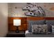 Close-up of the themed bedroom with an orange headboard and a Star Wars schematic mural at 977 Paradise Dr, Davenport, FL 33897