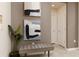 Inviting entryway with stylish bench seating, artwork, and neutral color palette at 977 Paradise Dr, Davenport, FL 33897