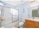 Inviting bathroom featuring a shower-tub combination, bright lighting, and a vanity sink at 979 Park Terrace Cir, Kissimmee, FL 34746