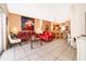 Bright living area open to the dining area, featuring tile floors and a seamless flow at 979 Park Terrace Cir, Kissimmee, FL 34746