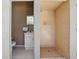 This bathroom includes a toilet and sink with an adjacent stand up shower featuring floor to ceiling tile at 9900 W Lake Marion Rd, Haines City, FL 33844