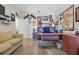 Inviting home office with a large desk, hardwood floors and ample shelving perfect for a work-from-home lifestyle at 9900 W Lake Marion Rd, Haines City, FL 33844