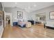 Spacious main bedroom with wood floors, ceiling fan, and an ensuite bathroom at 9900 W Lake Marion Rd, Haines City, FL 33844