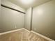 Neutral bedroom with carpeted floors, and a large, open space at 101 S Eola Dr # 1209, Orlando, FL 32801