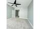 Spacious bedroom featuring neutral colored walls, carpet flooring, and white trim at 101 S Eola Dr # 1209, Orlando, FL 32801