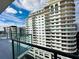 Exterior view of the condominium building from the balcony on a sunny day at 101 S Eola Dr # 1209, Orlando, FL 32801