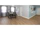 Dining space with table set, adjacent to windows and TV at 103 Mason Park Dr, Daytona Beach, FL 32117