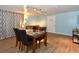 Game room with marble table, chairs, sofa, and recessed lighting, ideal for entertainment and relaxation at 103 Mason Park Dr, Daytona Beach, FL 32117