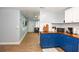 Kitchen with blue cabinets, wood counters, subway tile backsplash, and stainless-steel appliances at 103 Mason Park Dr, Daytona Beach, FL 32117