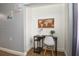 Small office space with a desk, map, decor, and a white chair at 103 Mason Park Dr, Daytona Beach, FL 32117