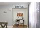 Inviting office space with hardwood floors, a modern desk, and tasteful decor at 103 Mason Park Dr, Daytona Beach, FL 32117