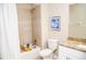 Well-lit bathroom features a shower-tub combination, granite counter-tops, and elegant decorative accents at 106 Oceans Cir, Daytona Beach, FL 32118