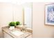 Bright bathroom with granite countertop, undermount sink, and modern decor at 106 Oceans Cir, Daytona Beach, FL 32118